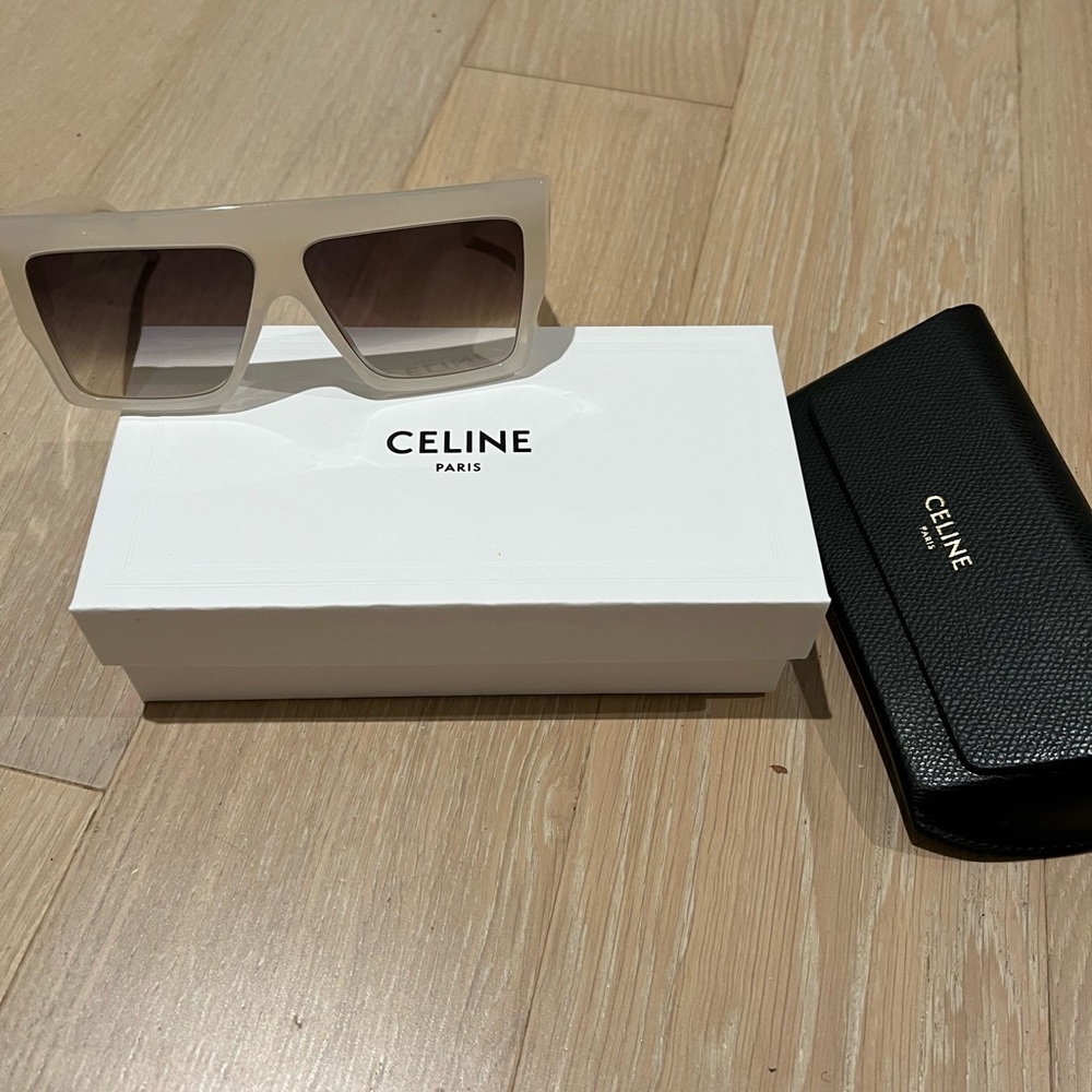 CELINE
51MM Rectangular Sunglasses
Shiny Milky Cream. Worn once.